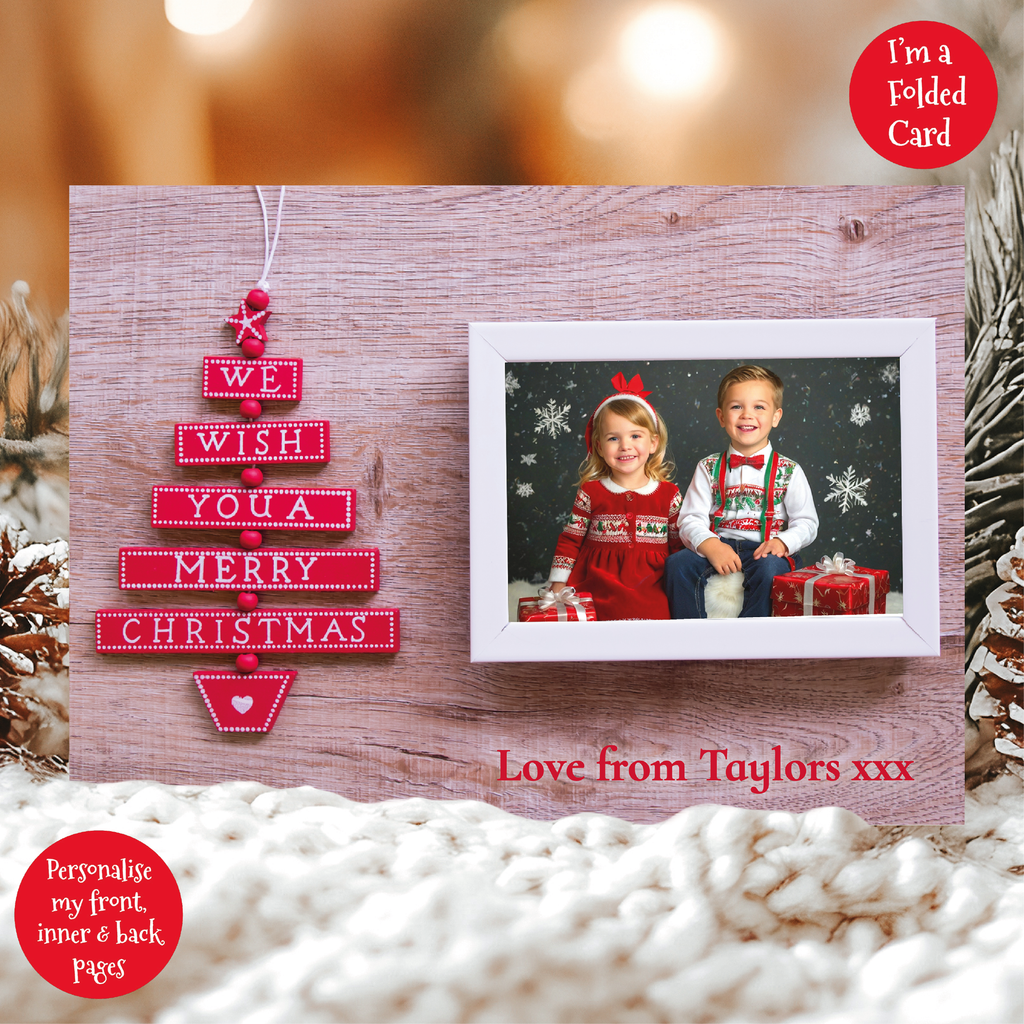 a christmas card with a picture of two children