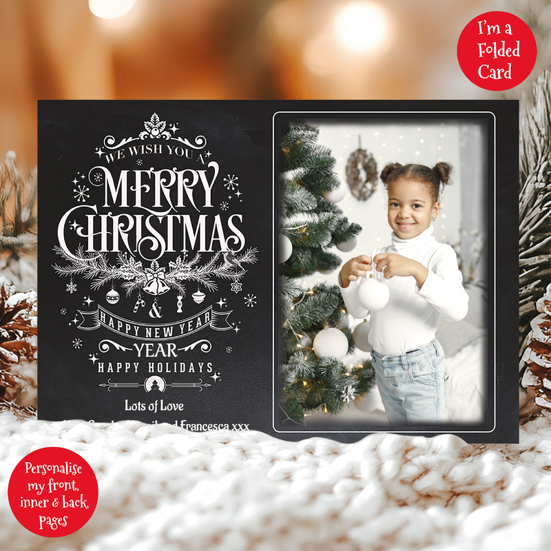 a christmas card with a photo of a girl in front of a christmas tree