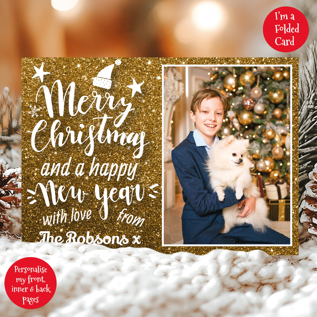 a christmas card with a picture of a boy holding a dog