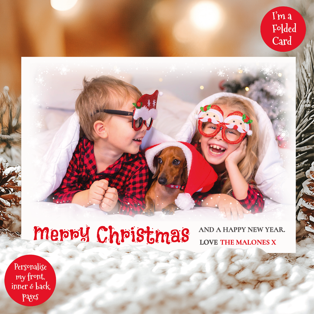 a couple of kids and a dog in a christmas card