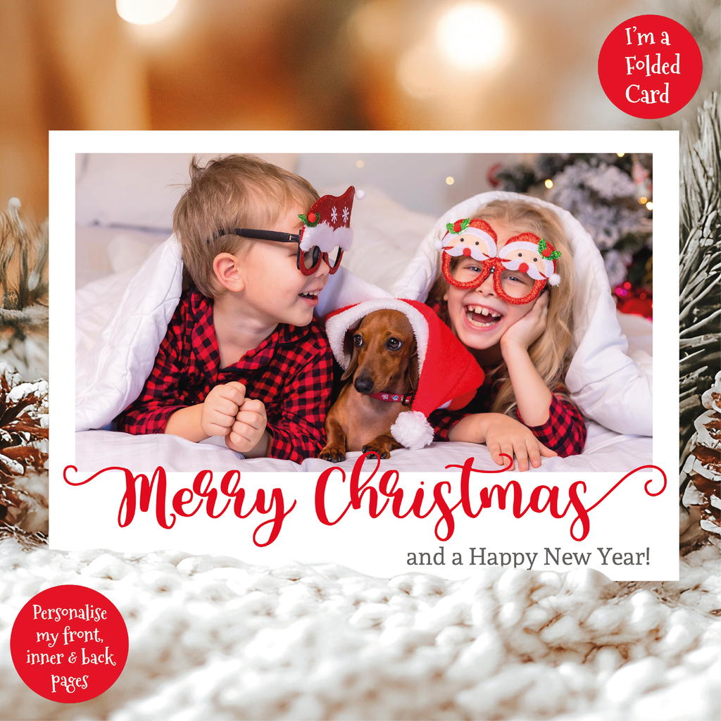 a christmas card with a photo of two kids and a dog